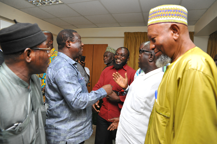  Mr Kwasi Amoako-Atta (left), the Minister of Roads and Highways, interacting with some of  the transport operators in Accra yesterday. Picture: EMMANUEL QUAYE
