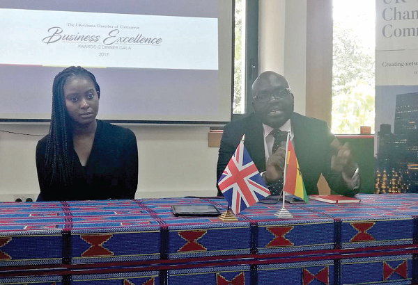  Mr Tony Buckson (right) addressing the media