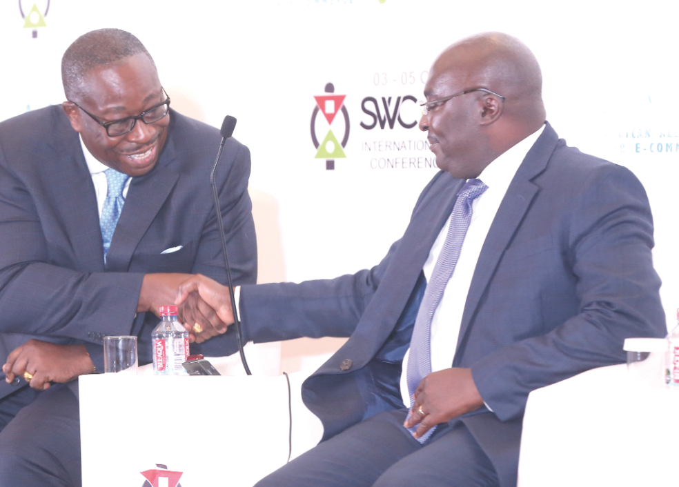 Dr Nortey Omaboe (left), Executive Chairman, GCNet, interacting with Vice President Dr Mahamudu Bawumia during the Single Window Summit in Accra.
