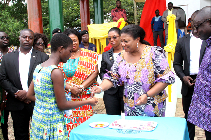 Mrs Akufo-Addo administering the drug supplement