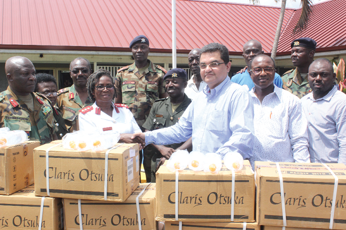  Mr Rajesh Wadhwani (3rd right), presenting the items to Col Josephine Vowotoh (2nd left), a Matron of the 37 Military Hospital. Picture: NII MARTEY M. BOTCHWAY