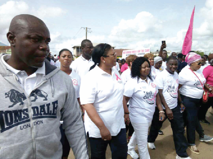 Mrs Akufo-Addo (2nd left) in a walk to mark this year's breast cancer awareness month in Koforidua in the Eastern Region 