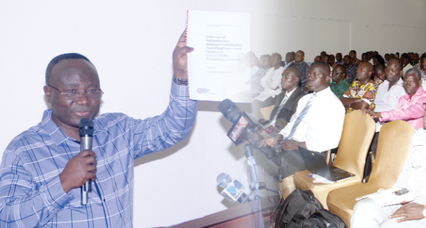 Mr Adjenim Boateng Adjei, the Chief Executive of Public Procurement Authority, launching the report.