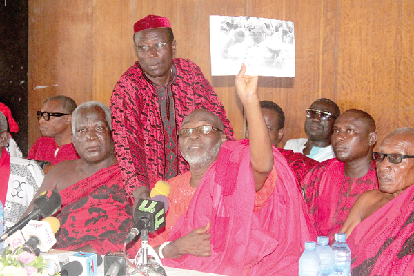  Nii Yaote Oto-Ga II (2nd left), the Dzasetse of the Ga Paramount Stool, displaying documents during the press conference. With him are Nii Yartey Yartey (left), an Elder of Amugi We and Nii Yaya Addy (3rd left), the head of family, Abola Piam. Picture: Maxwell Ocloo