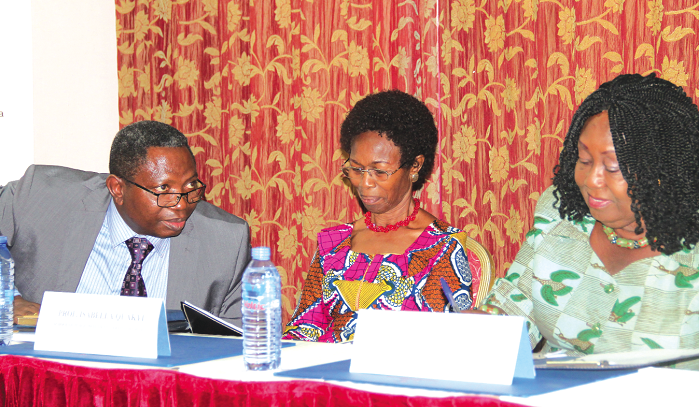 Mr Kyeremeh Atuahene (left), Director of Research, Monitoring and Evaluation, Ghana Aids Commission (GAC), explaining a point to Prof. Isabella Quakyi (middle) and Dr Mokowa Blay Adu-Gyamfi (right) Picture: EDNA ADU-SERWAA
