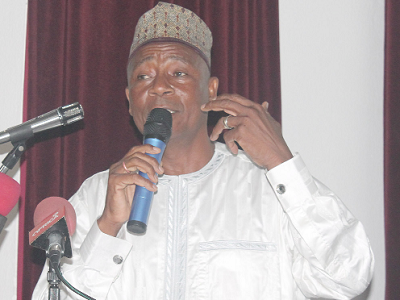 Mr Boniface Abubakar Saddique (inset) addressing participants at the conference.