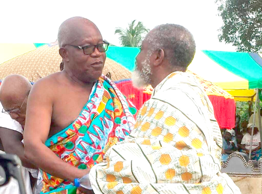 Togbe Afendza III and Togbe Komla Teng V shaking hands after the ceremony