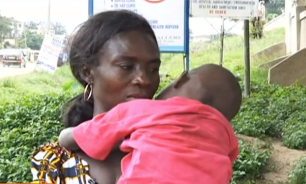 The defiled victim girl being carried by her mum