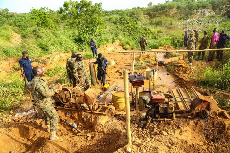 The Operation Vanguard joint task force recce team at an illegal mining site in the Central Region