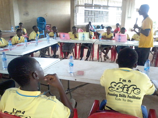 PPAG officia, Mr Michael Tagoe addressing the youth facilitators