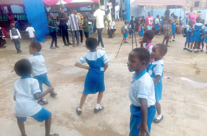 It was boogie time for these kids just before the ceremony came to an end.