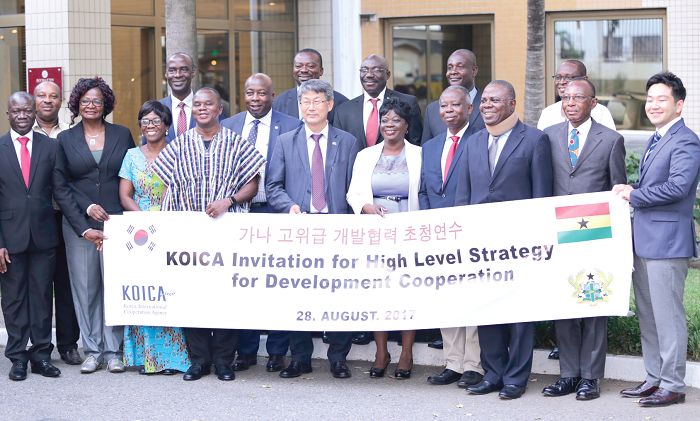 H.E. Sungsoo Kim (5th left), Korean Ambassador to Ghana and Mr Kizito Dorzie Ballans (4th left), Chief Director of the Office of the President in a group photograph with the chief directors