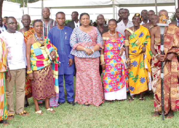 The First Lady with the queen mother of Abam, Nana Ama Amafuo I (2nd left), Chief of Abam, Nana Abam (2nd right), Mr Eugene Sackey, the DCE, (3rd left)  and some elders