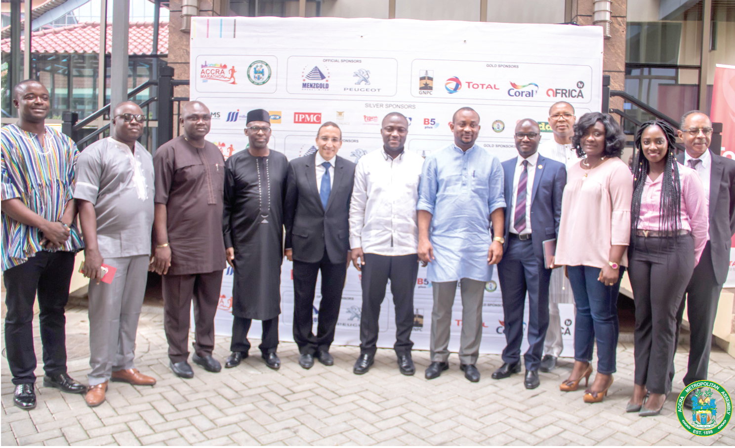 Organisers of the Accra Marathon with Pius Enam Hadzide (arrowed), the Deputy Minister of Youth and Sports, sponsors and the AMA Chief Executive, Mohammed Adjei Sowah (6th left), after the launch