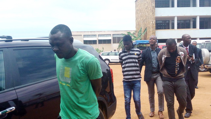 FLASHBACK: The three accused persons being escorted out of the court premises