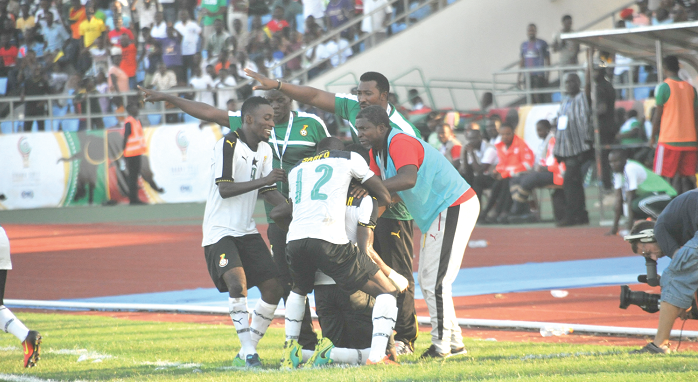  Black Stars B players and Coach Maxwell Konadu (right) celebrating the team’s late winning goal. Picture: Ebow Hanson