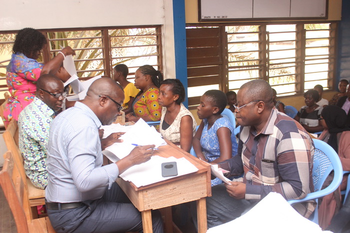 Some prospective students with their parents going through the registration process at St Mary's Senior High School at Korle Bu