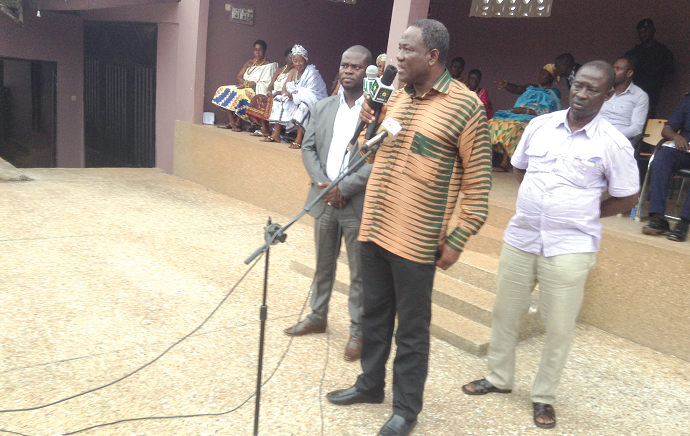 Mr Samuel Kofi Ahiave Dzamesi, Minister of Chieftaincy and Religious Affairs addressing the chiefs and elders of Sefwi-Wiawso. On his right is the Municipal Chief Executive of the Sefwi-Wiawso Municipality, Mr Owusu Agyapong