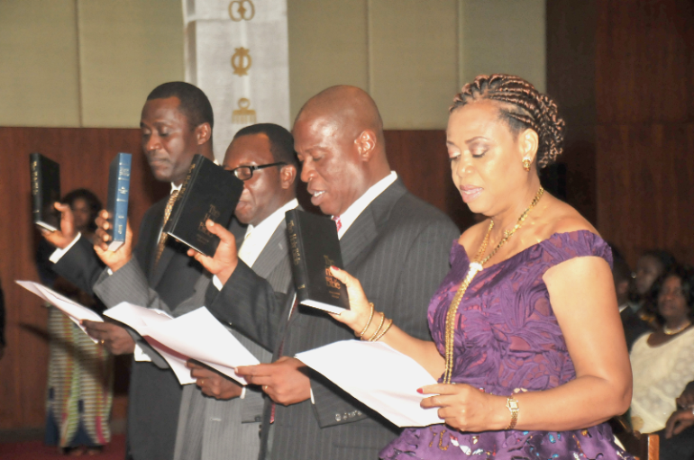 The four taking the oath of office at a ceremony in Accra