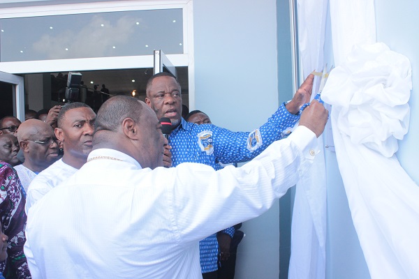 Arch Bishop Nicholas Duncan William together with Rev Dr Isaac Quaye and Dr Lawrence Tetteh cutting tape to dedicate the building to God.