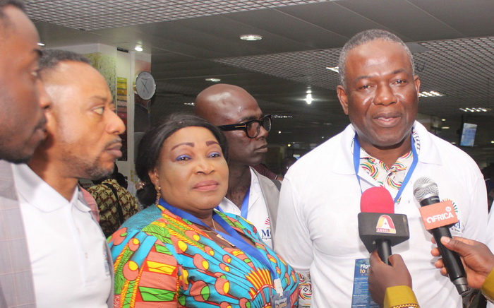 Mr Dzamesi speaking to some journalists at the Kotoka International Airport. 