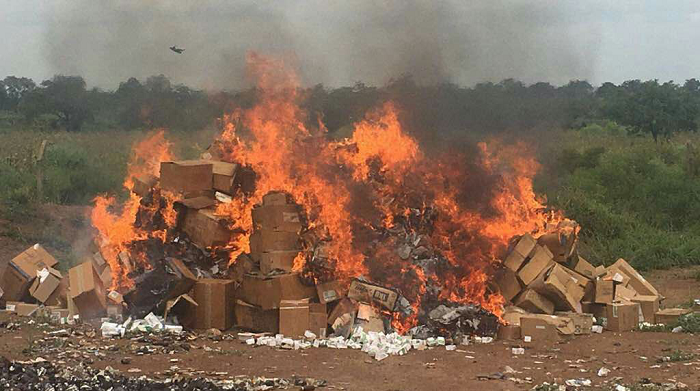 Some of the expired drugs being set ablaze