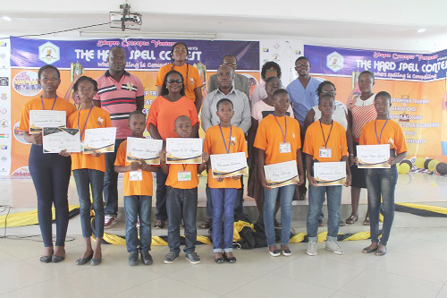 The winners of the various categories of the contest displaying their  certificates. With them are officials of Edupro Concept Ventures which organised the event. 