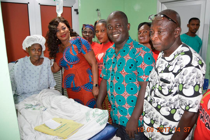Madam Pokuah Sawyerr (2nd left) with  Benedicta  and some officials of the hospital