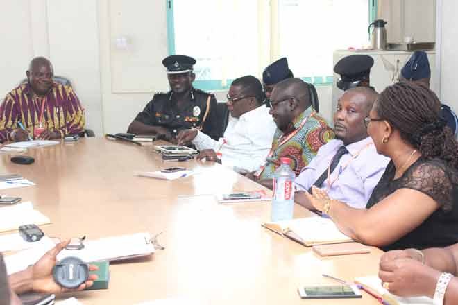 Ms Doreen Hammond (right), Features Editor, posing a question to DCOP Mr George Alex Mensah. On his right is Mr Ransford Tetteh, Editor, Daily Graphic and other editoral staff, Kobby Asmah, Political Editor, Enoch Darfah Frimpong, Deputy Online Editor and Martin Omare, Assistant Circulation Manager at the meeting. Pictures: Benedict Obuobi