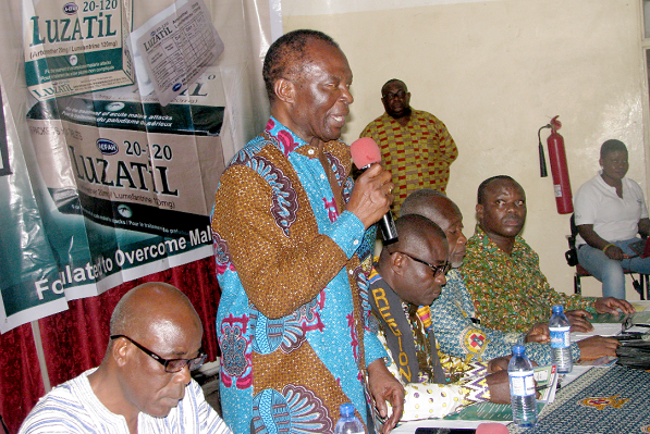Mr Harrison Kofi Abutiate (with mic) addressing participants at the durbar. With him include Mr Audu  Rauf (left) and Mr Moses Nii Amon Sasraku (3rd left), Regional Chairman of Over the Counter Medicine Sellers Association.