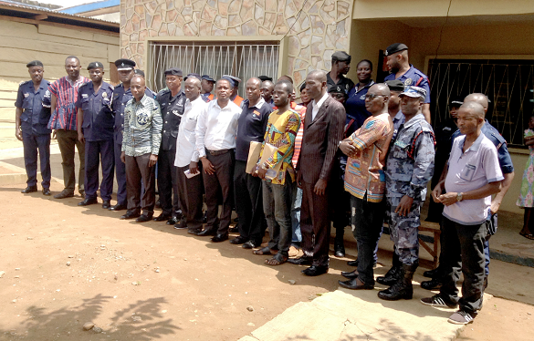 Mr Asare (4th left), the DCE with the police. On his right is Superintendent Yussif, the District Police Commander