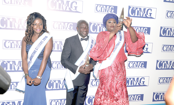 FROM left: Ms Lorlonyo Nuworsu, Marketing Student, Mr Ebenezer Twum Asante, Marketing Man and Mrs Abiola Bawuah, Marketing Woman of the year.  Picture: DOUGLAS ANANE-FRIMPONG