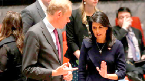 Nikki Haley (right) talking to UK envoy Matthew Rycroft before the UN Security Council meeting