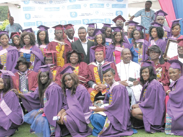 Mr  Stephen R. K. Ossom (2nd right), Human Resource Manager of Mab Group of Companies, with some dignitaries and the graduates. Picture: ESTHER ADJEI