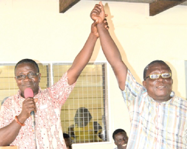 Mr Delali Amexo (with mic), Chairman of the Electoral Committee of the Association, announcing Mr Partey (right) as winner of the election. Picture: DELLA RUSSEL OCLOO