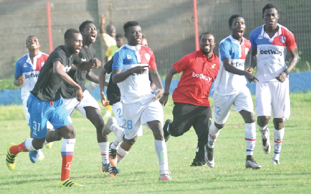 Liberty Professionals lone-goal hero  Elvis Baffour (No. 28) is joined by his teammates to celebrate his goal.