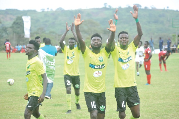 • Players of Dreams FC acknowledging cheers from their supporters after yesterday’s victory.