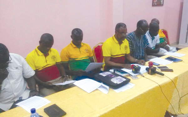 Mr Francis Owusu-Boamah (4th left) addressing the media