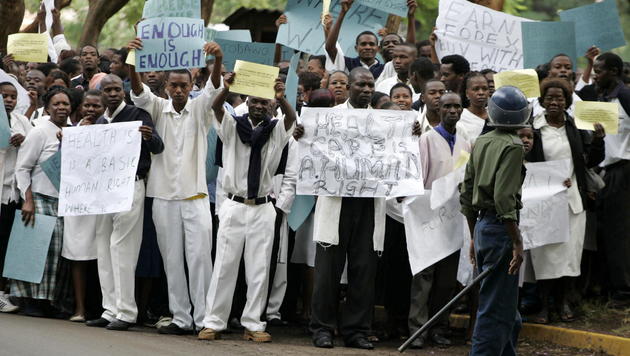Image result for Zimbabwean govt sacks 10,000 striking Nurses