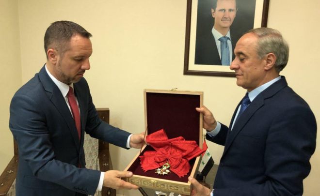 The award was handed back via the Romanian embassy, which represents French interests in Syria