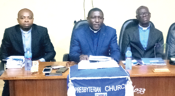 Rev. Dr Ofosu-Addo (middle) addressing the press