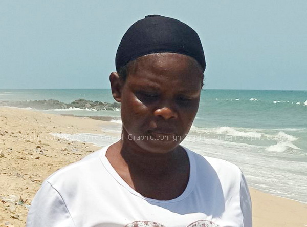 Larteley Mensah, the mother who buried her daughter, at the scene during the exhumation of the body  