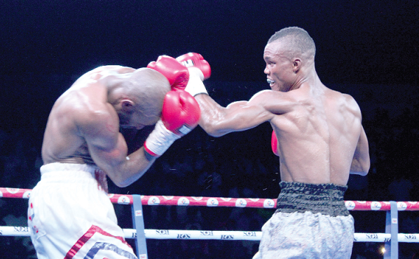 George Ashie (right) swings a left hook to the guarded face of Mokoena in their brawl last Friday night