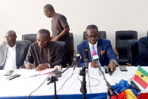 The management of  ECG and the deputy minister at the launch of the project in Kumasi
