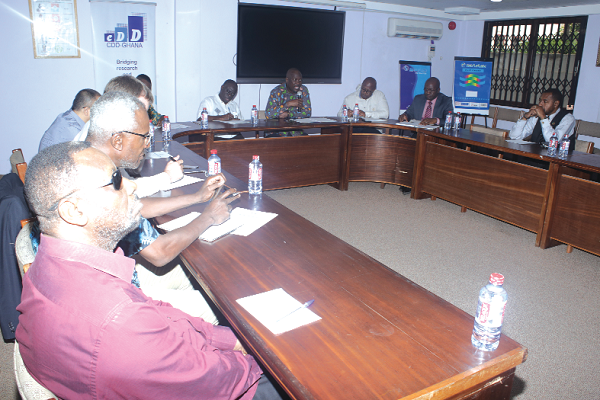 Professor Kwasi Prempeh (4th right), the Executive Director of the CDD-Ghana, speaking at the discussion.