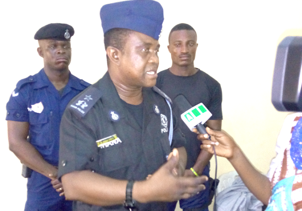  Chief Superintendent Abraham Acquaye, the Nima Divisional Police Commander, explaining a point.