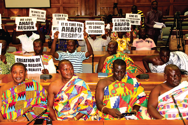  Some people of the Ahafo area of the Brong Ahafo Region displaying placards during the public hearing. Picture: EDNA ADU-SERWAA