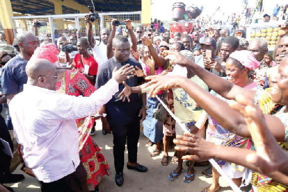 President Akufo-Addo responding to cheers from the crowd who witnessed the inauguration of the refurbished Albert Bosomtwi-Sam Fishing Harbour.