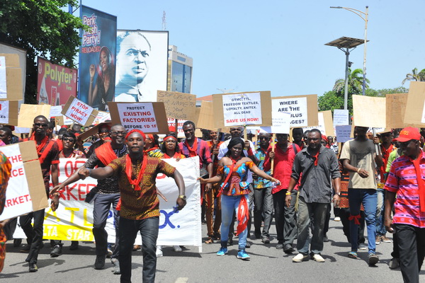 Some members of the Coalition of Textile Workers demonstrating on the streets of Accra