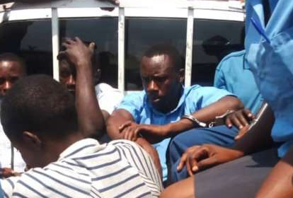  Mr Manirambona was handcuffed and taken away by police 